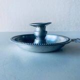 Old aluminum candle holder