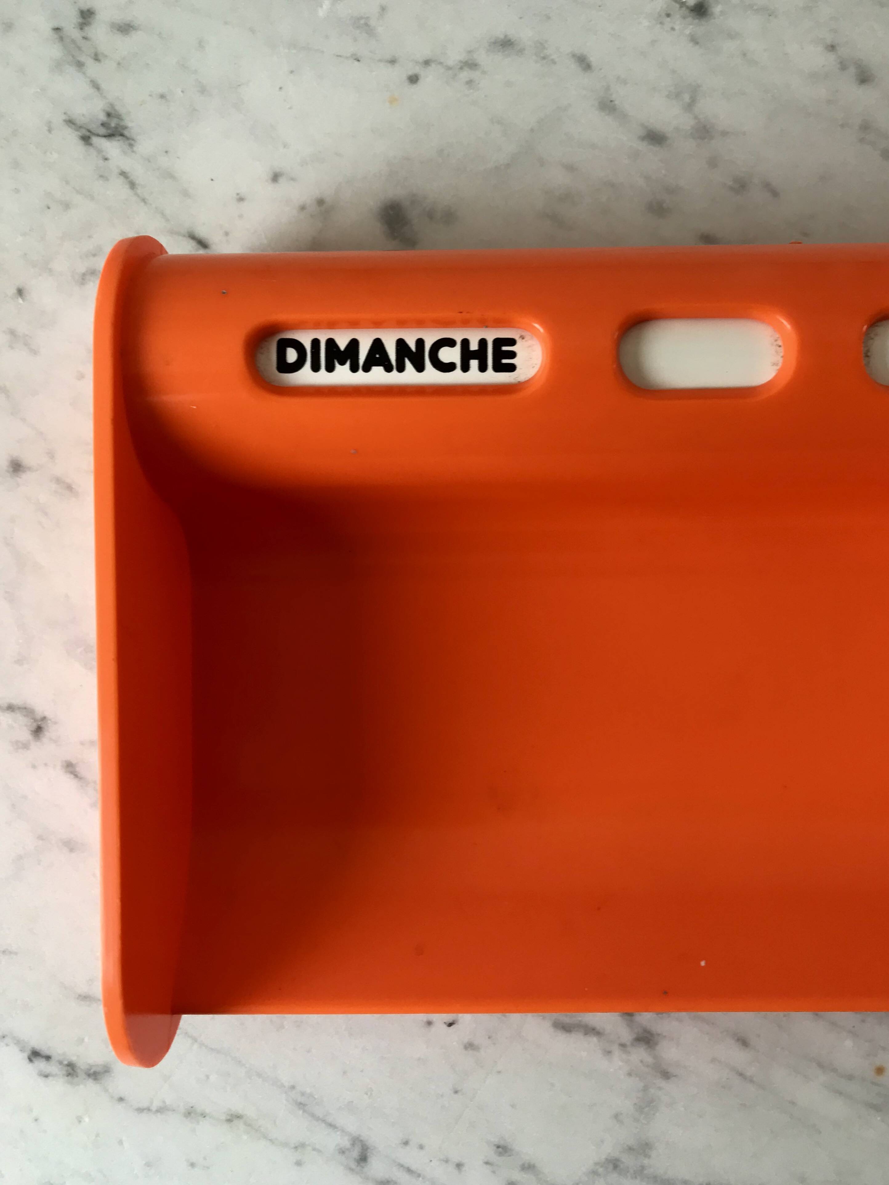 Dater empty pocket in orange plastic seventies 70s