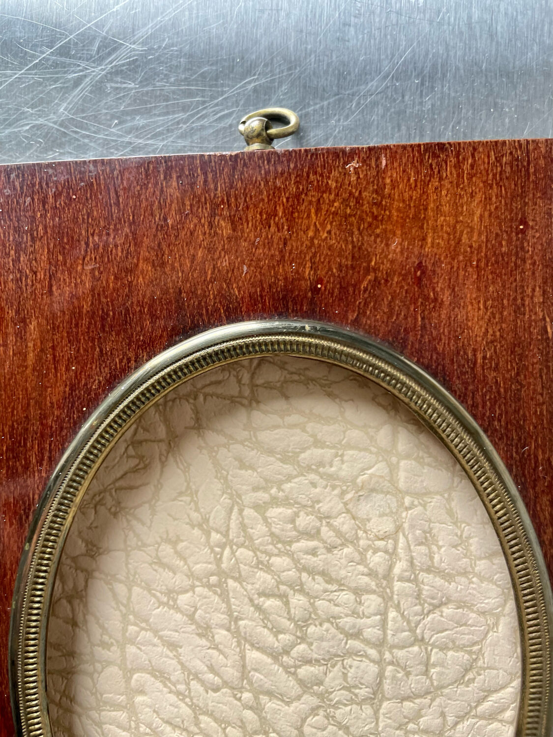 Mahogany wood frame with brass borders