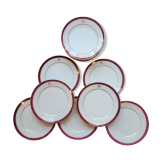 13 assiettes à dessert monogramme HS