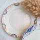 Round orange and blue plate HBCM and Creil and Montereau