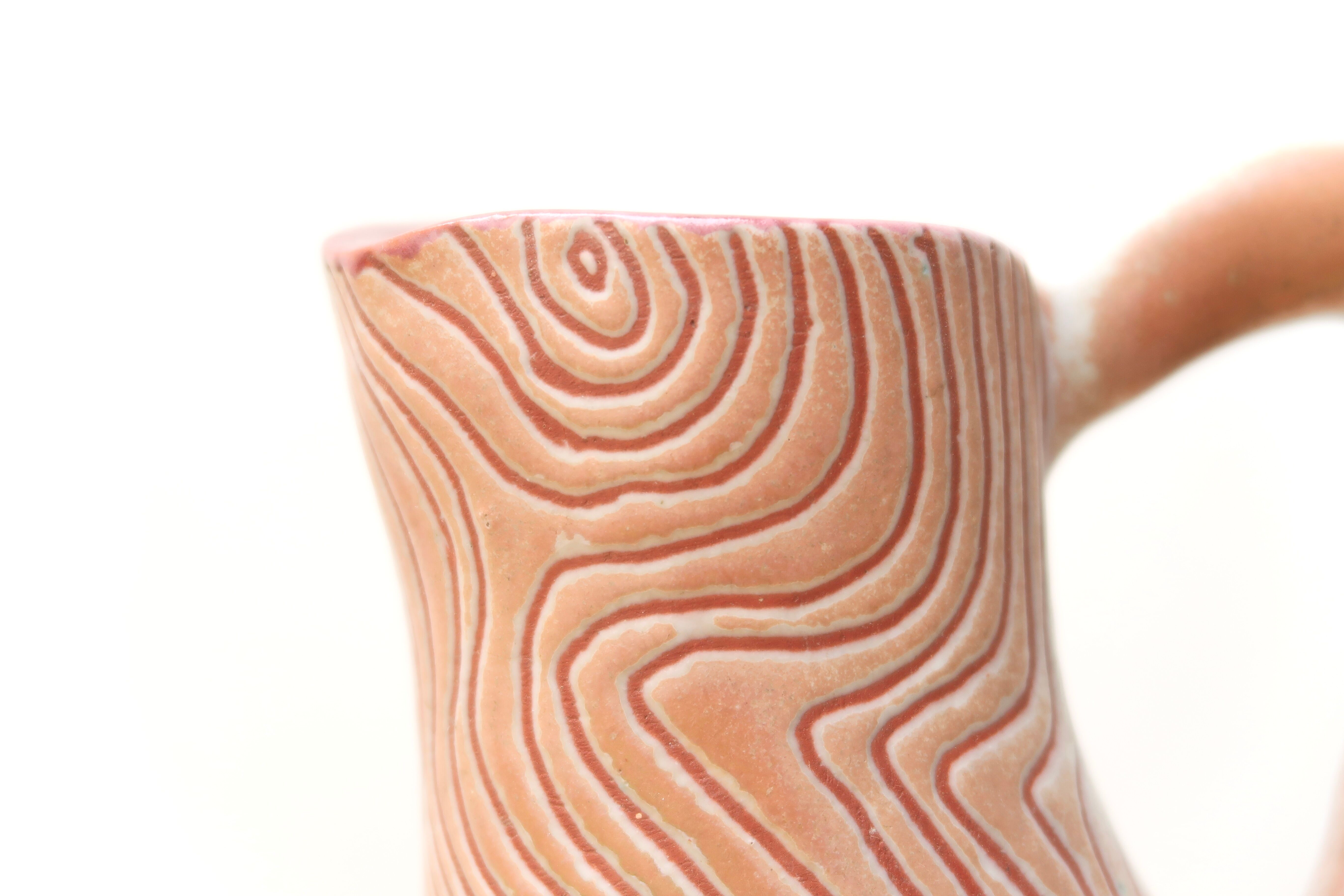 Pink scarified pitcher by Henry Algan, 60s
