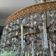 Old brass chandelier and crystal grapevines