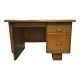 Vintage wooden desk with rounded edges