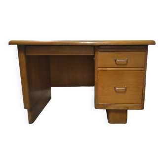 Vintage wooden desk with rounded edges