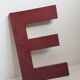 Lettre enseigne E