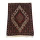 Tapis persan ancien laine tons rouge noué main