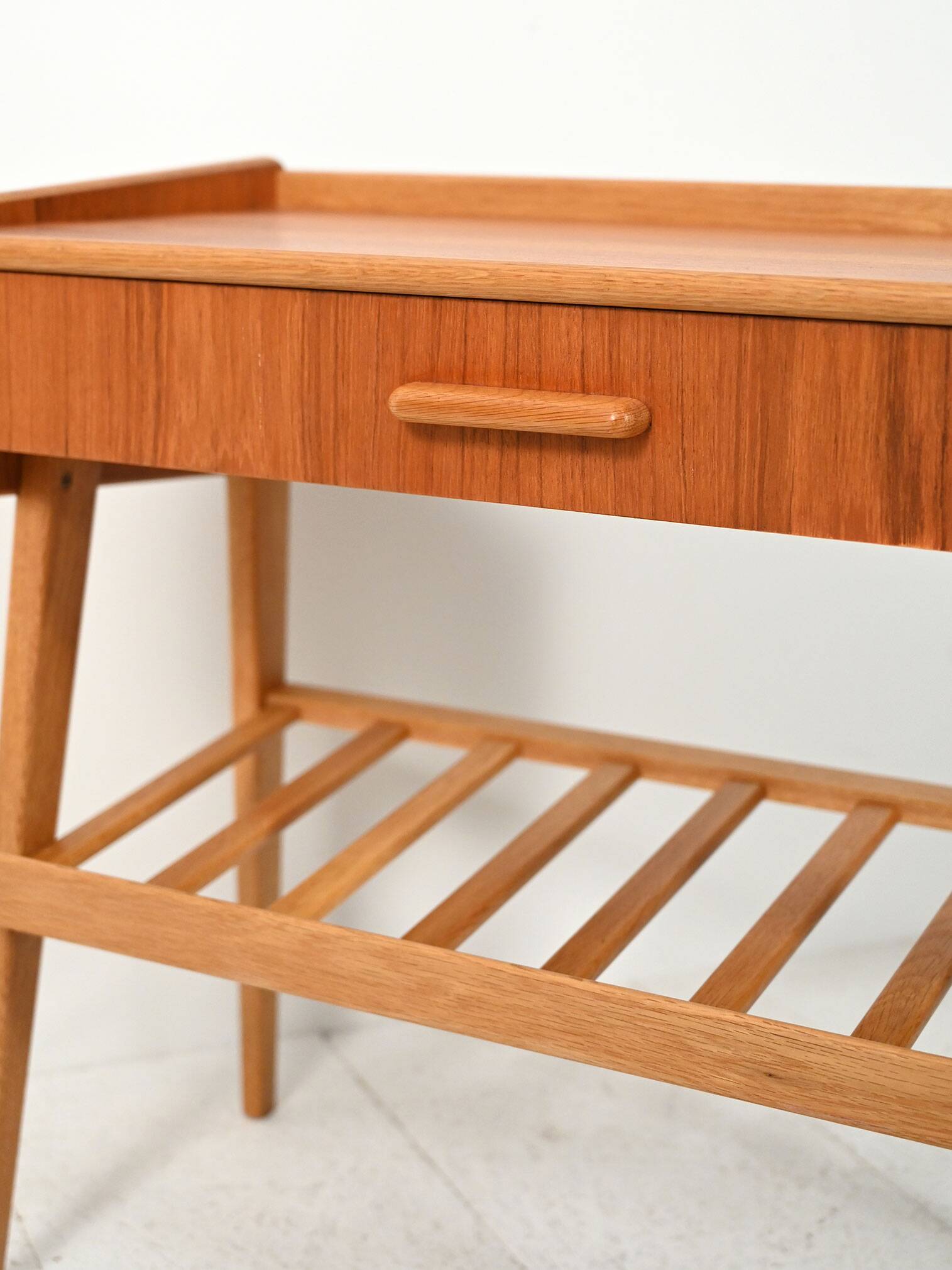 Scandinavian bedside table with drawer and magazine rack