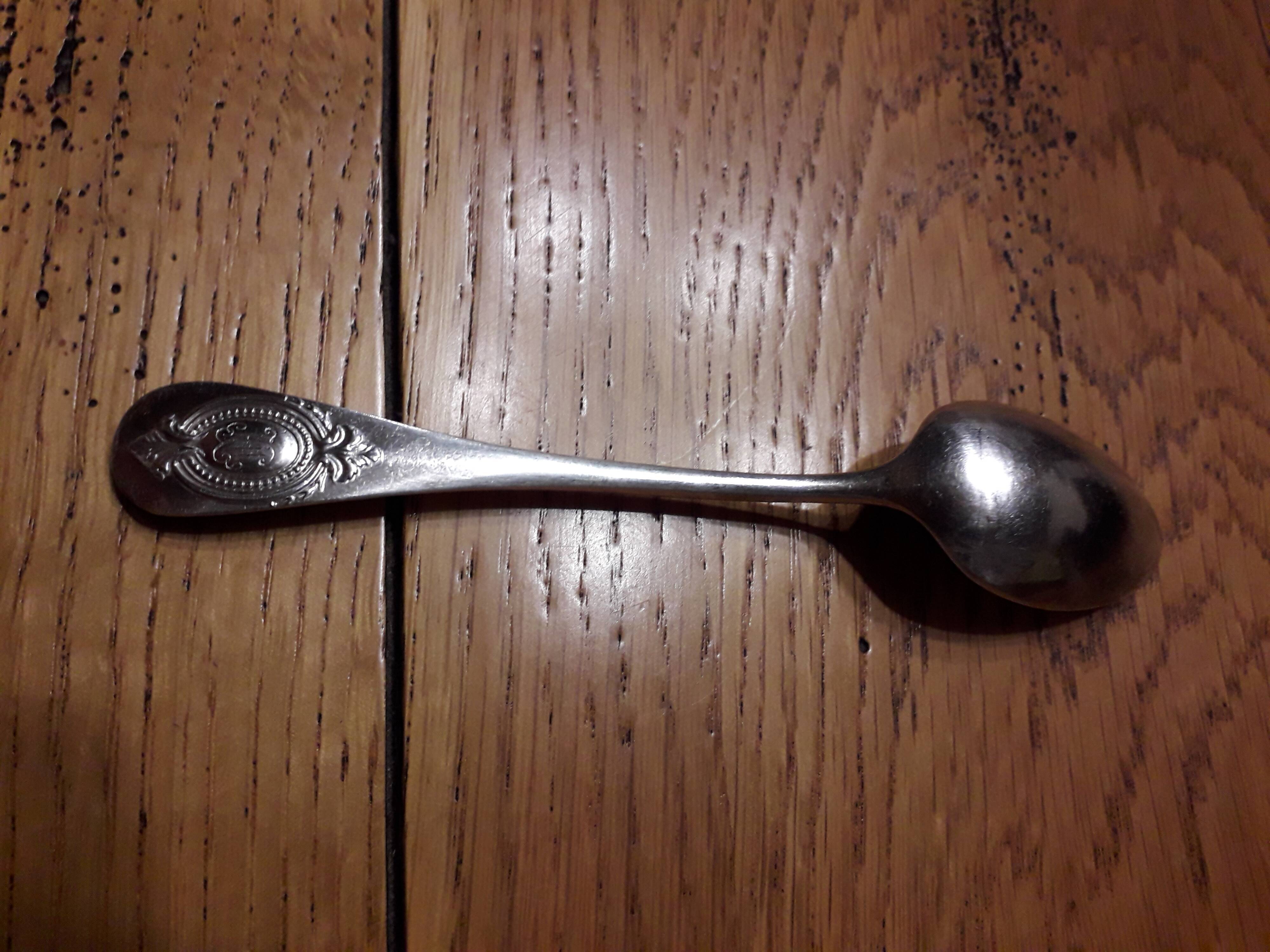 12 teaspoons silver metal
