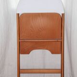 Designer folding chairs in wood and fabric