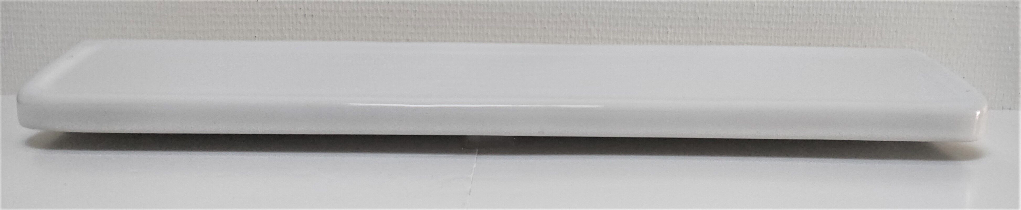 Vintage white glazed ceramic wall shelf