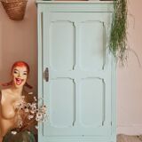 Parisian wardrobe small format soft green interior terracotta