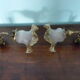 Wall lamps, opaque corolla and iridescent ochre lampshade, brass and wood support