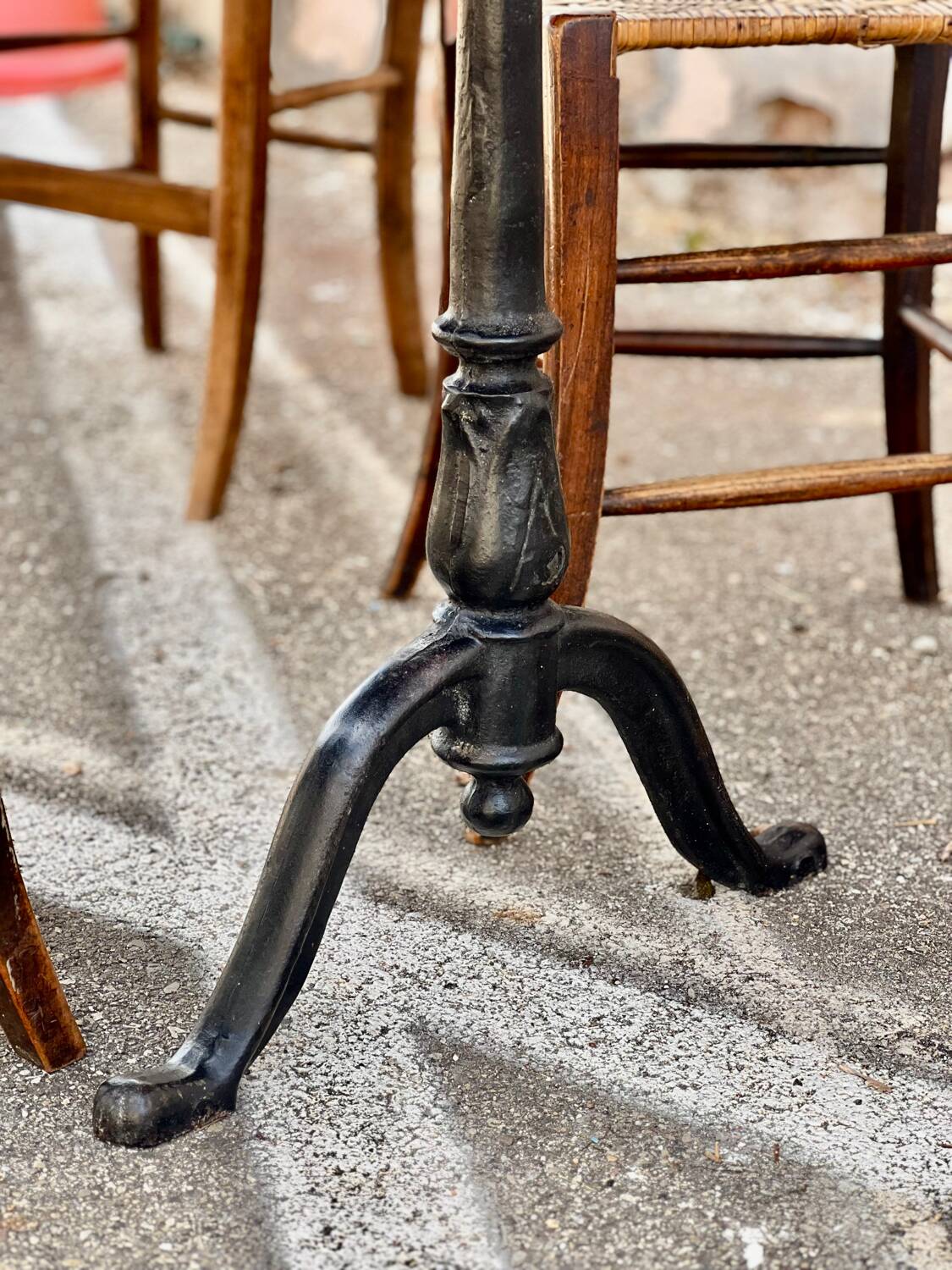Antique bistro table with cast iron legs