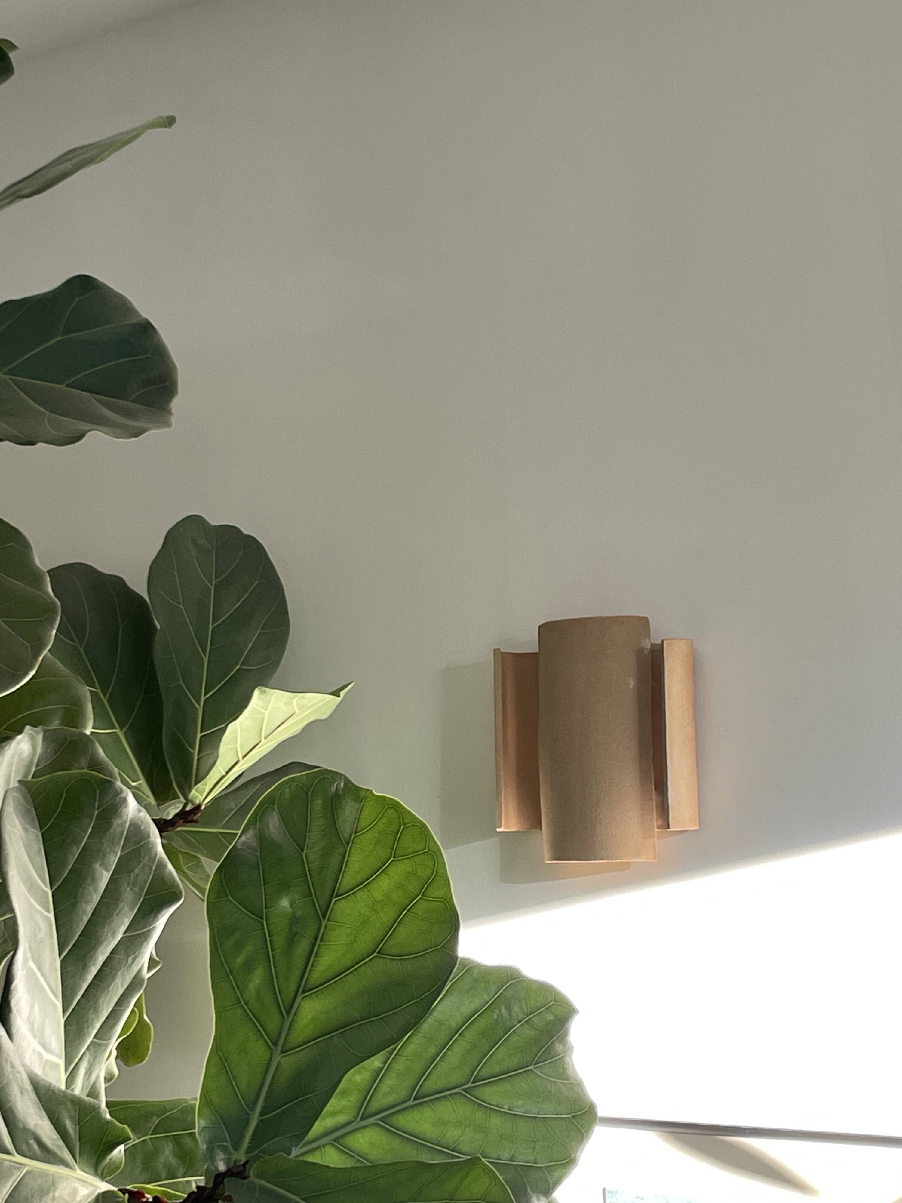 Set of 2 red TILE wall lights.