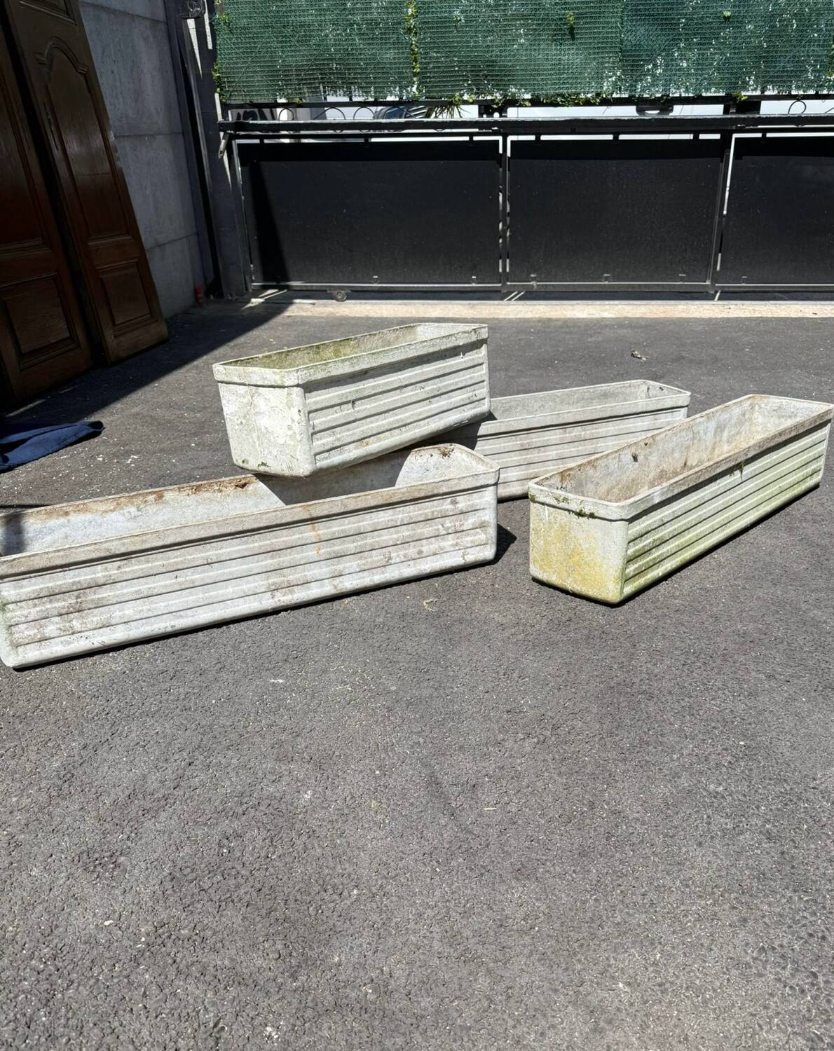 Set of 4 fibreglass planters by Willy Guhl