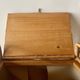 Large vintage rattan and wicker sewing basket with floral decor seat