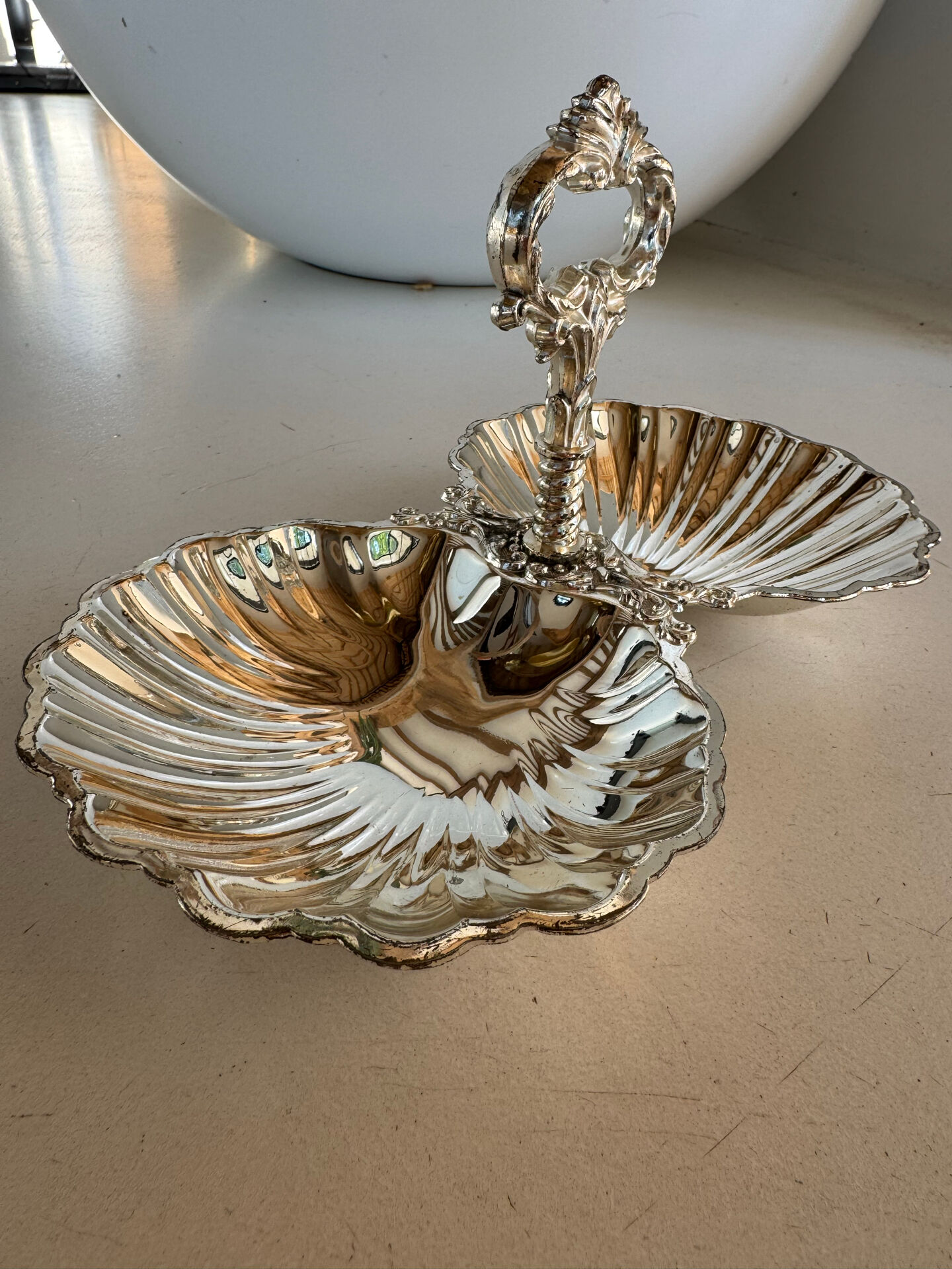 Vintage silver-plated shell display stand