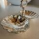 Vintage silver-plated shell display stand