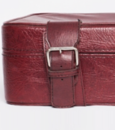Red faux leather suitcase