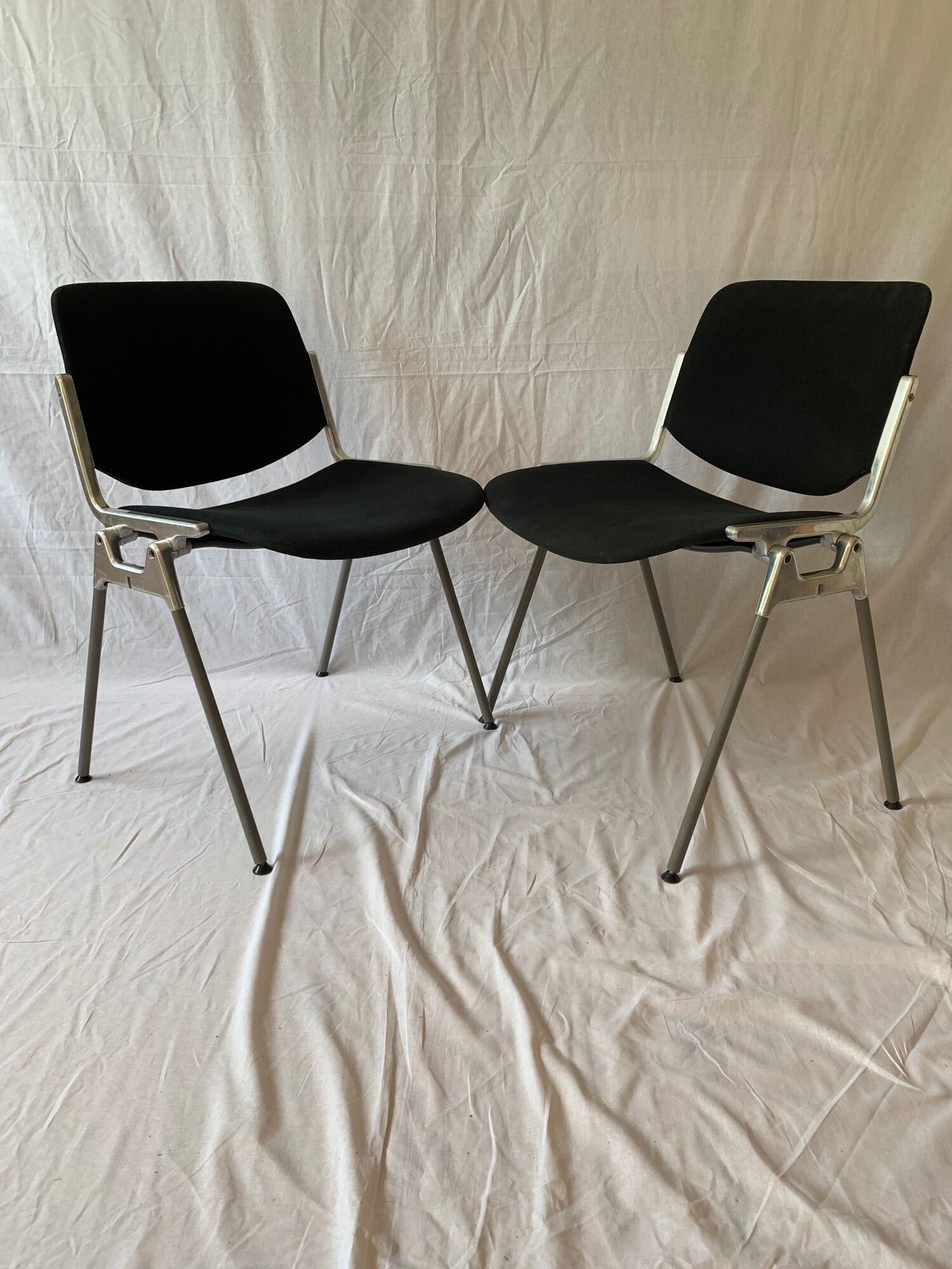 A set of four Castelli DSC 106 chairs, designed by G. Piretti, Italy, 90s