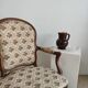 Fauteuil cabriolet de style Louis XVI garniture tapisserie fleurie