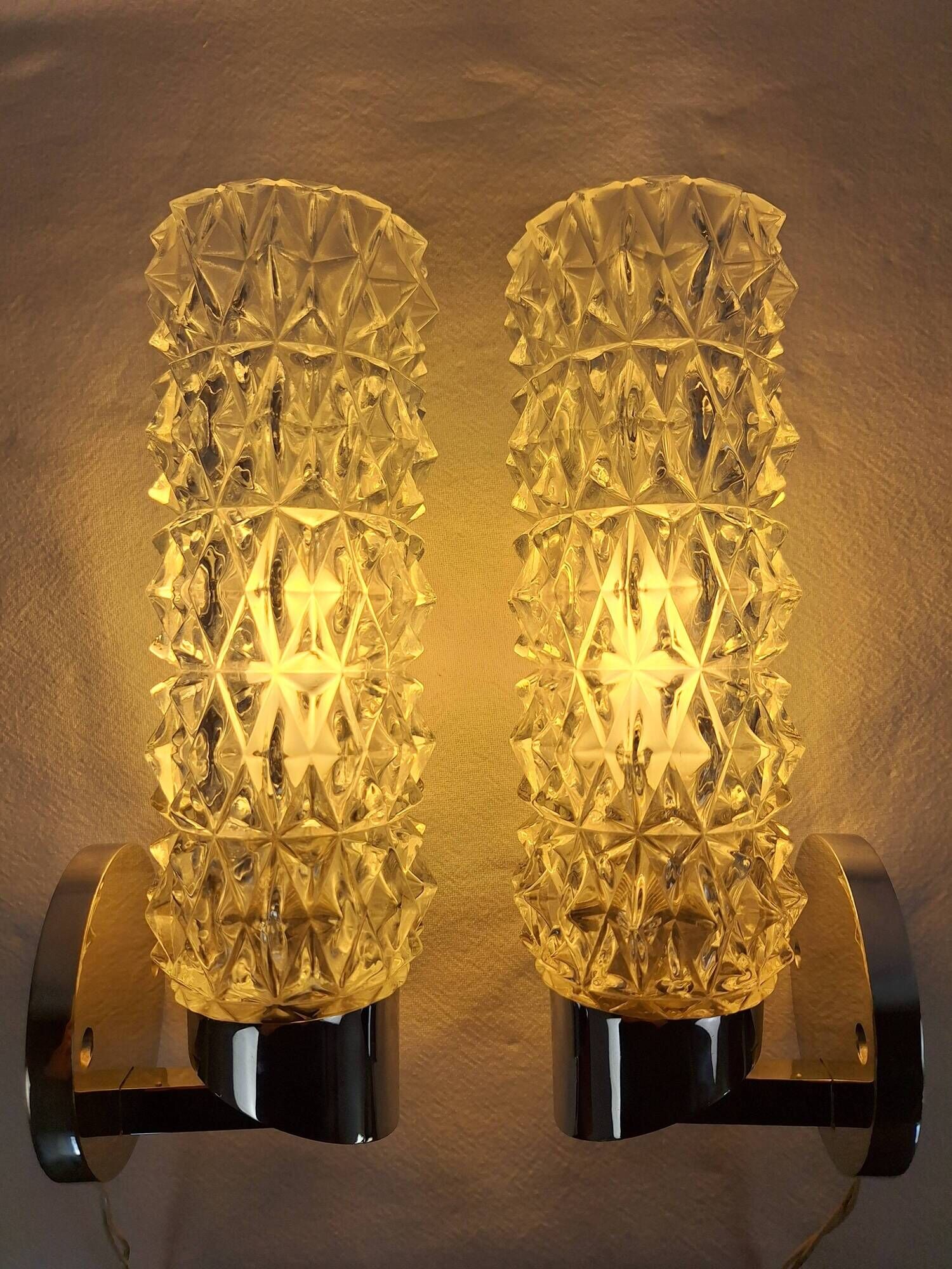 Pair of vintage Art Deco space age chrome and molded glass wall sconces
