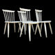 Série de 4 chaises vintage en bois massif style Scandinave