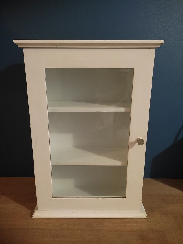 Glass cabinet showcase figurines collection