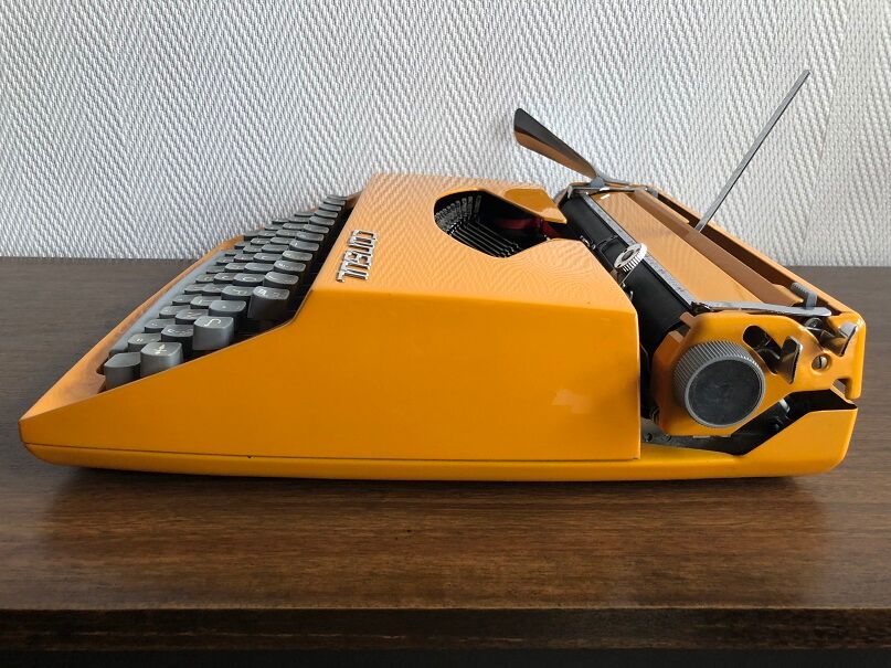 Orange consul typewriter 1970s