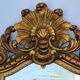 Antique wall mirror in carved gilded wood, Louis XV style, 19th century, 98 x 57 cm.