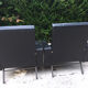 Paire de fauteuils skaï noir, 1960