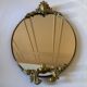 Elegant old oval mirror