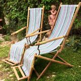 Pair of 19th-century wooden deck chairs with pegged frames and wrought iron