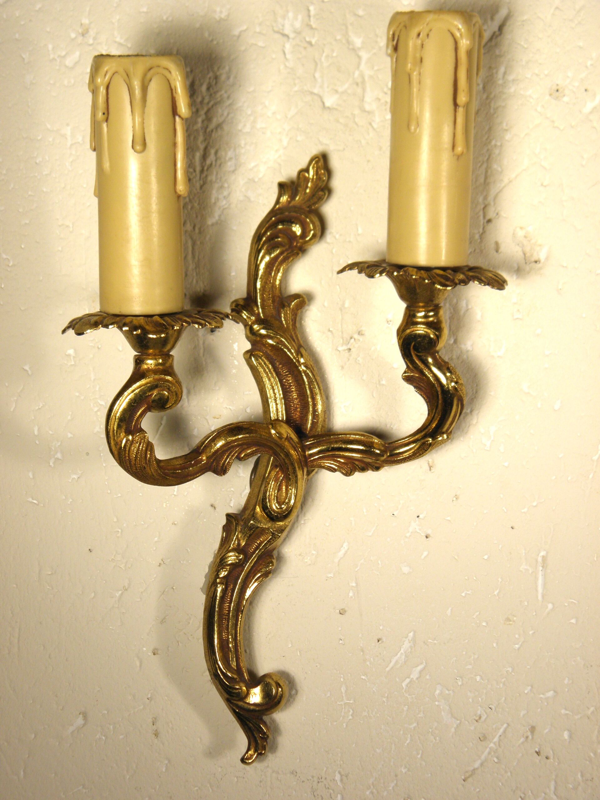 Pair of gilded bronze sconces
