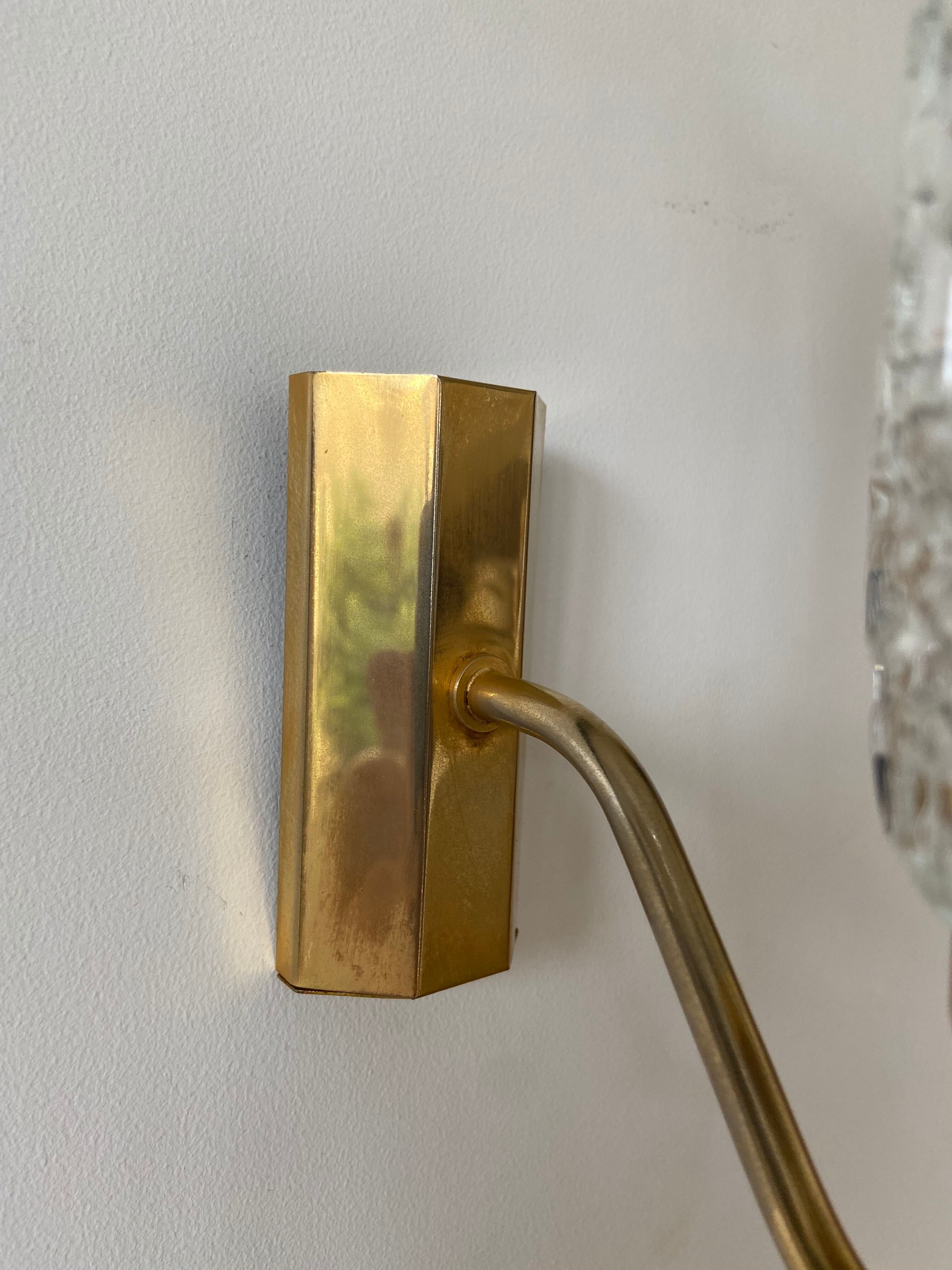 Gold metal and chiseled glass wall sconce