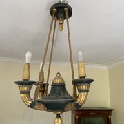 Empire style chandelier with four lights in sheet metal, bronze with patina and gilding