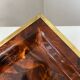 Plateau vintage plexiglass lucite effet écaille cerclage laiton 1970