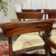 Set of 2 armchairs and 6 English mahogany chairs from the 1950s.