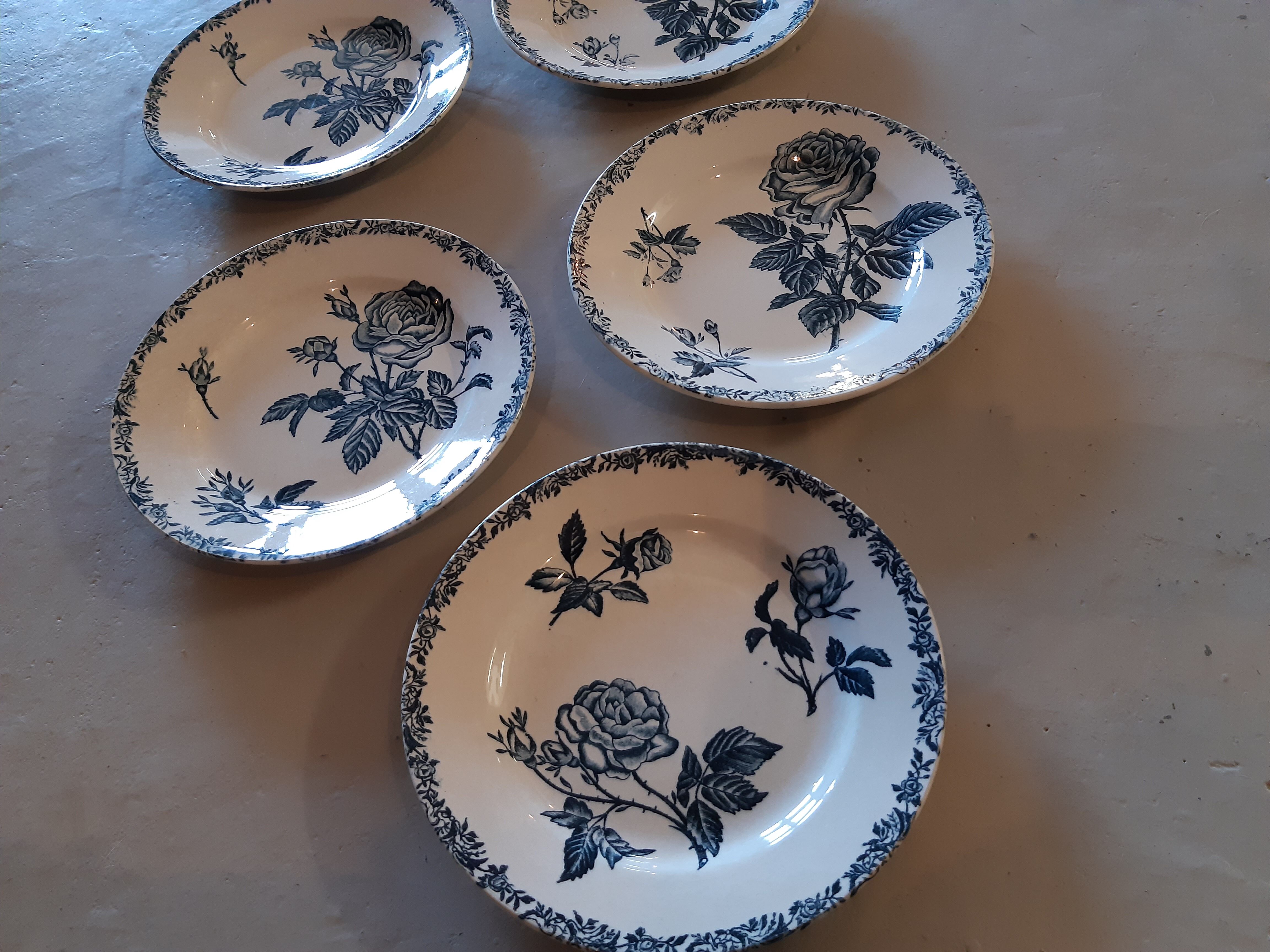 5 flat plates with Blue Rose Decorations. iron earth
