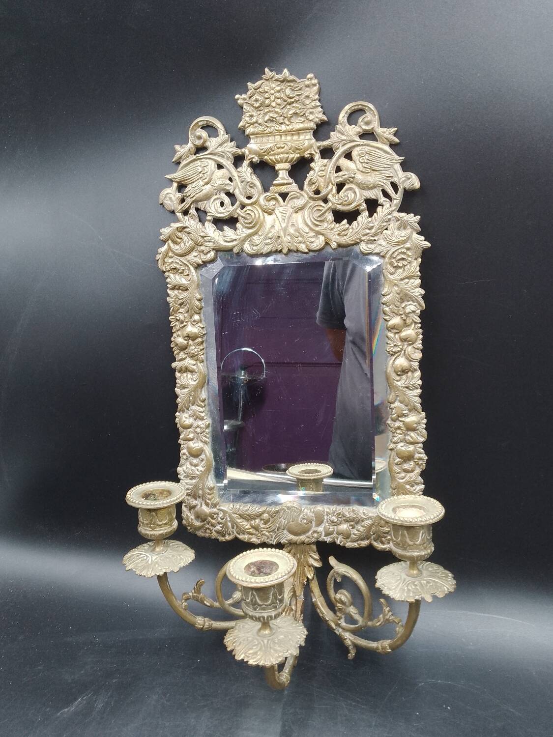 Repousse brass wall mirror with three candles, beveled glass, end of 19th century, double eagles