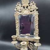 Repousse brass wall mirror with three candles, beveled glass, end of 19th century, double eagles