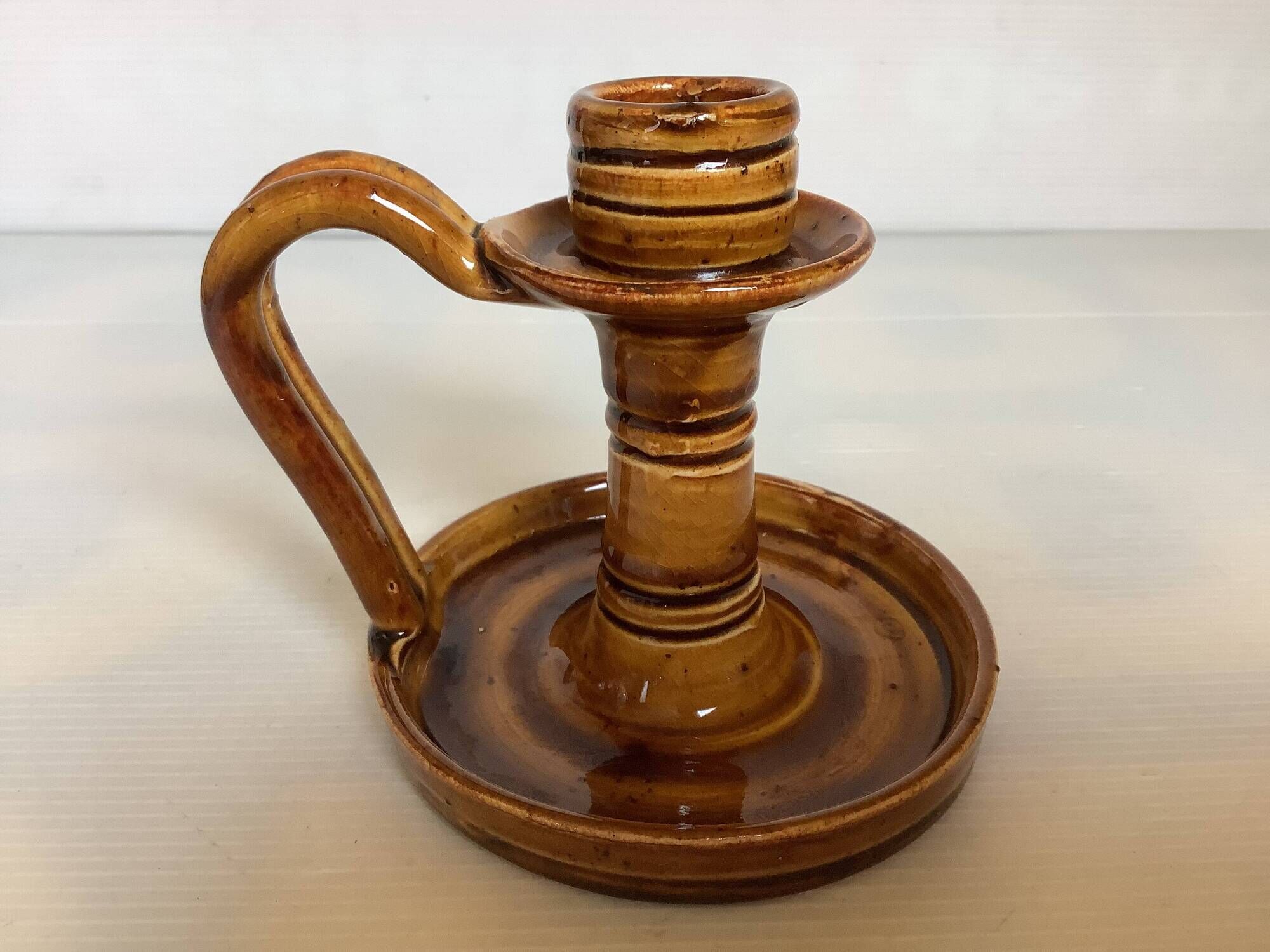 Ochre brown ceramic candle holder