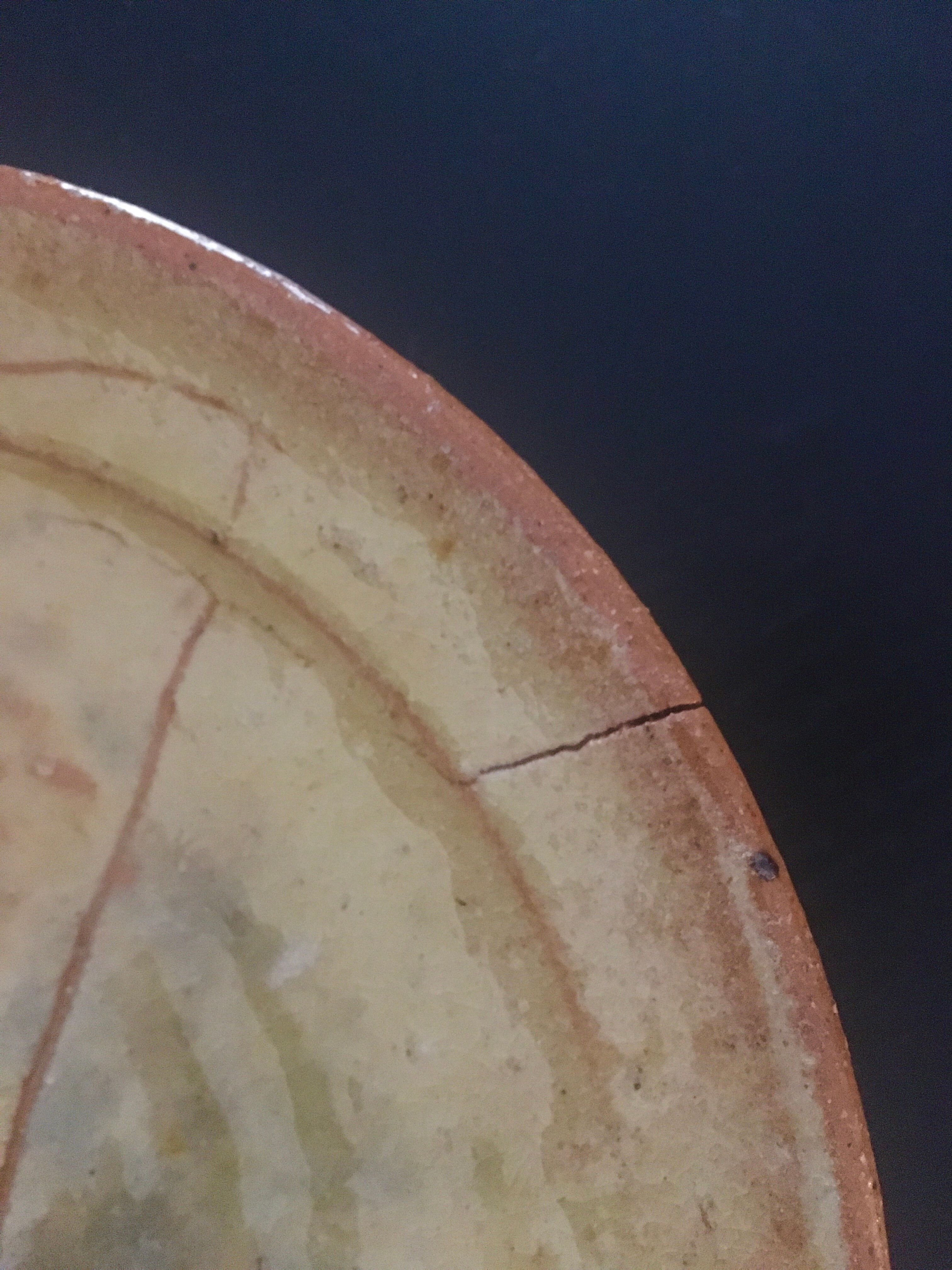 Decorated terracotta duo of dishes