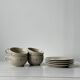 Ceramic cups and saucers with flower decoration