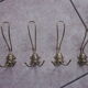 Lot de 4 patères ancienne en metal doré