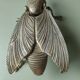 Vintage metal fly, old ashtray to divert