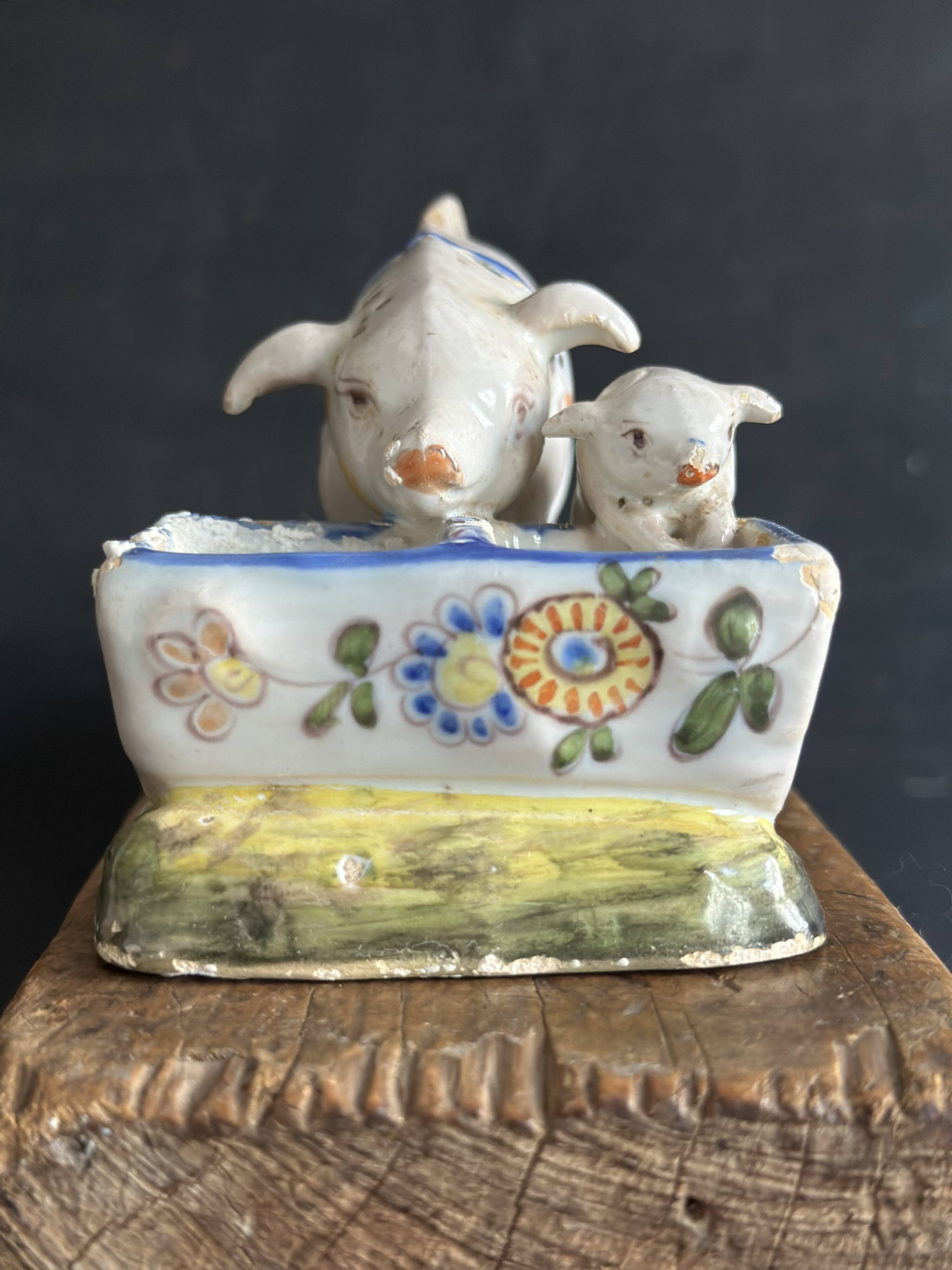 Antique earthenware pig box, salt cellar or mustard pot, floral decoration.