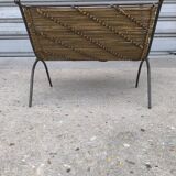 Wrought iron and wicker magazine rack