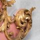 Italian rococo-style headboard in carved gilded wood, 19th century.